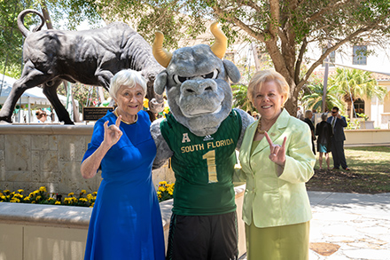 Regional Chancellor Holbrook (L) and President Law (R) pose with Rocky