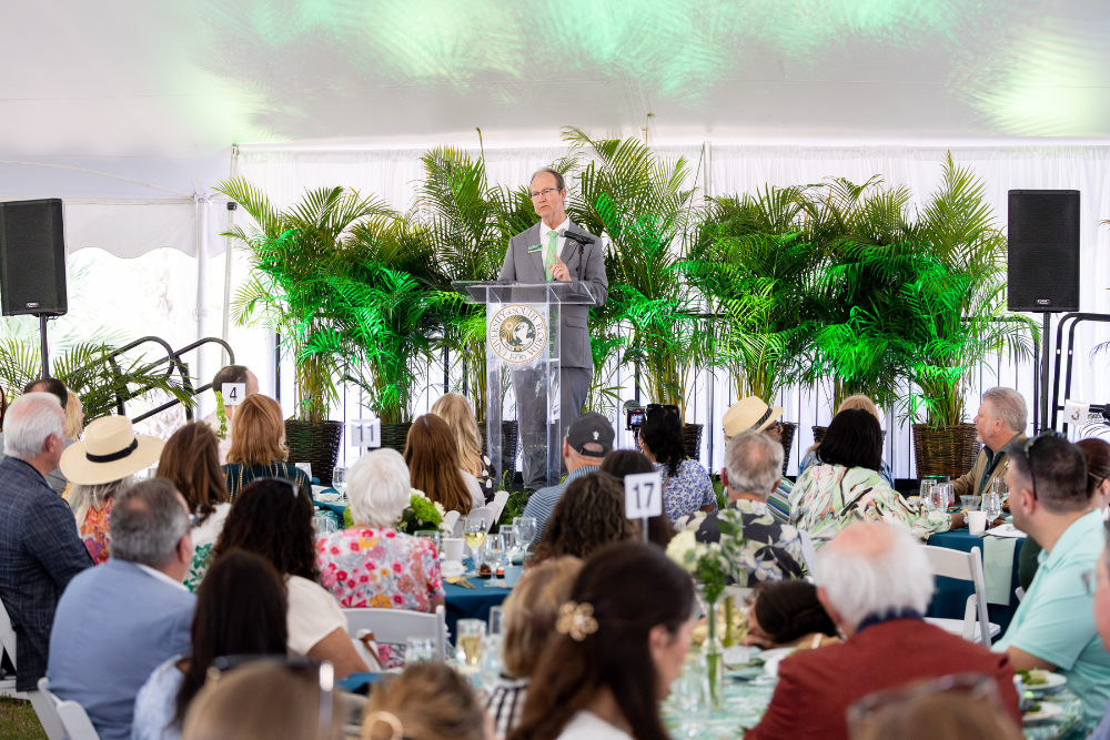 Dr. Kemker speaking at Brunch on the Bay