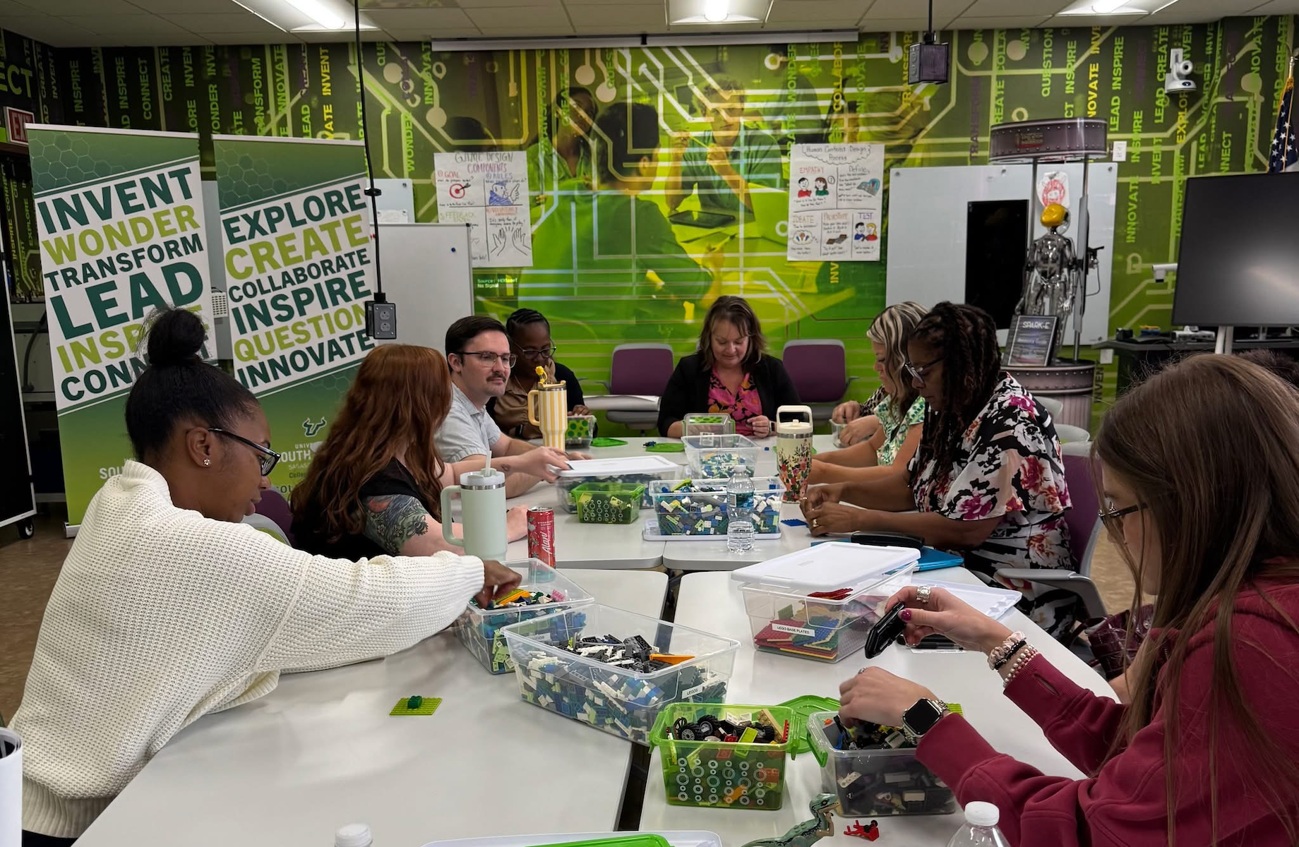 Adults working with legos in the Collaboratory