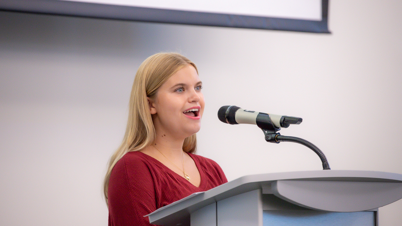 girl singing national anthem