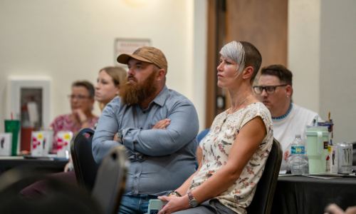 Duvall audience listening to panel