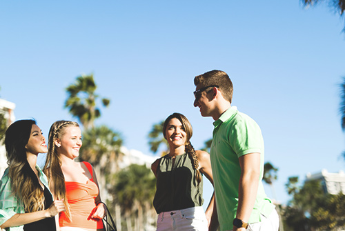 Students talking on campus.