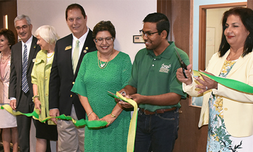 Students and USFSM officials welcome the Honors Program Collaborative, Room B130, and Learning Support Services Tutoring Center, Room B128, on Wednesday.