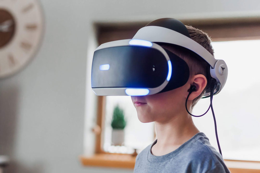 Child using VR in classroom.