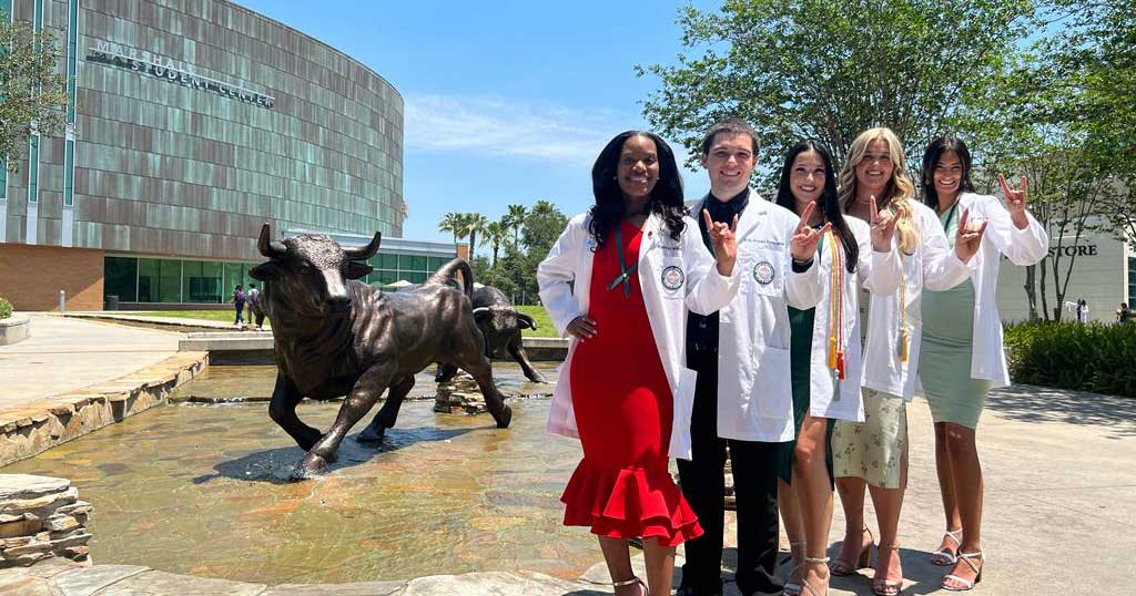 Nursing students outside stem building