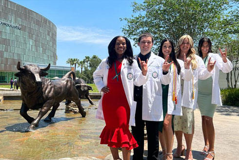 Nursing students outside stem builing