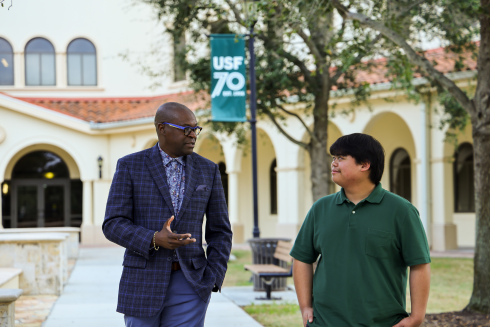 Darren and Andre talk as they walk around campus