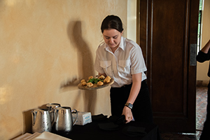 A student serves food