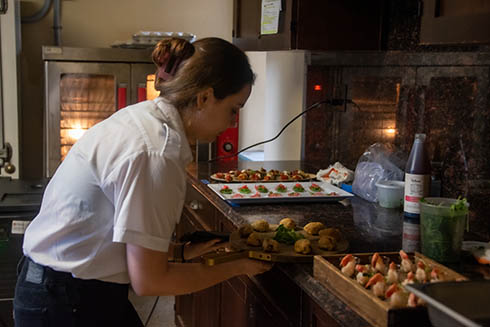 USF student prepares food