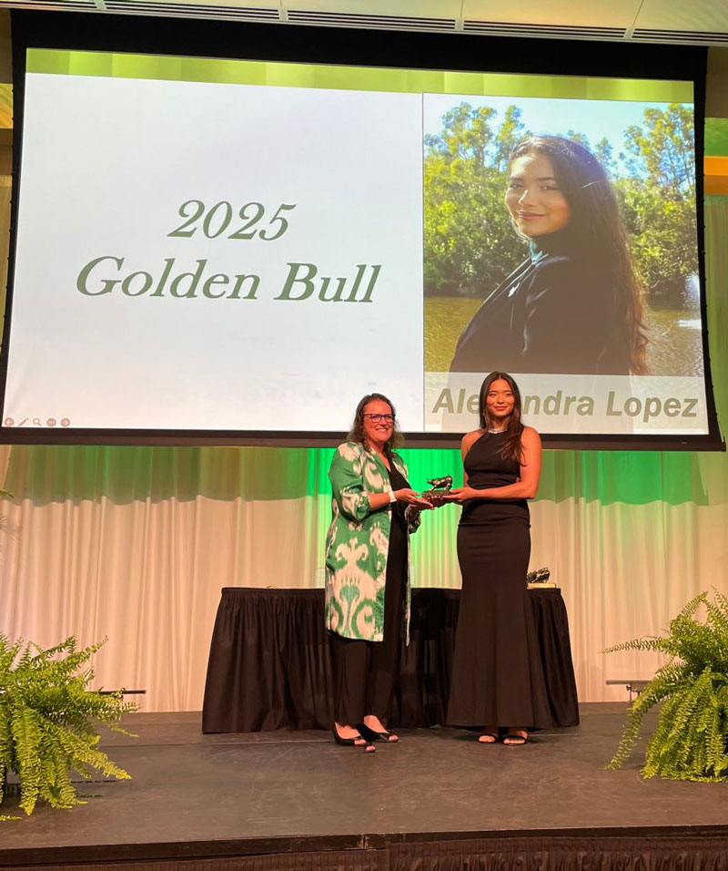 Alexandra Lopez receiving award