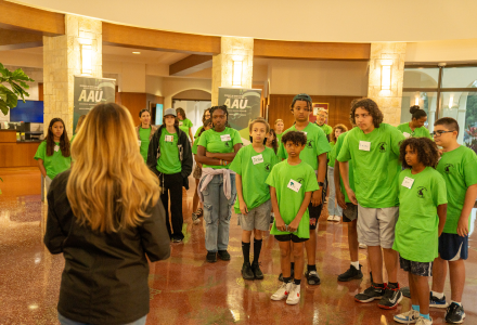 campers taking a tour on campus