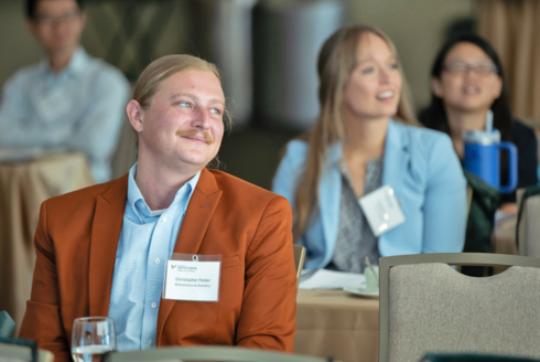 New faculty members smiling 