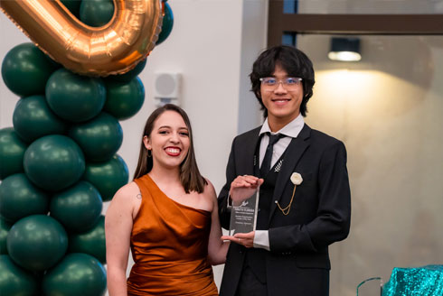 Fummy Nguyen receiving award