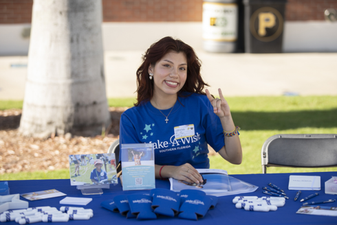 Maria Bustinza posing go bulls sign