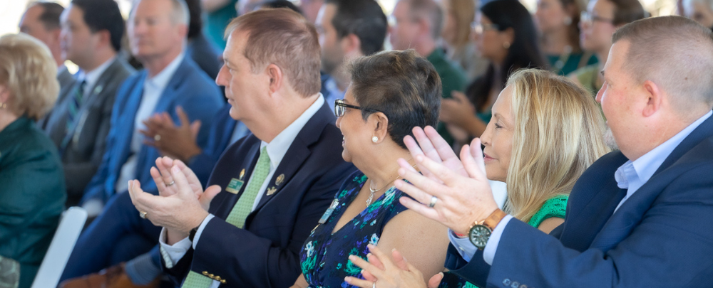 The community gathers to celebrate this milestone