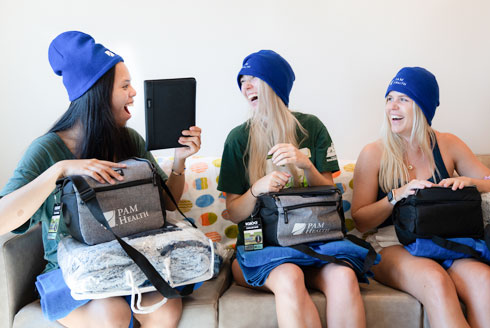 Students enjoy gifts from USF during move in day.
