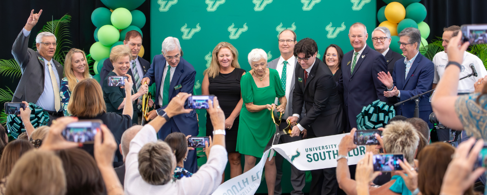 Spence at Atala Hall ribbon cutting