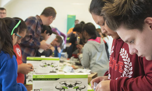 Students working on drones